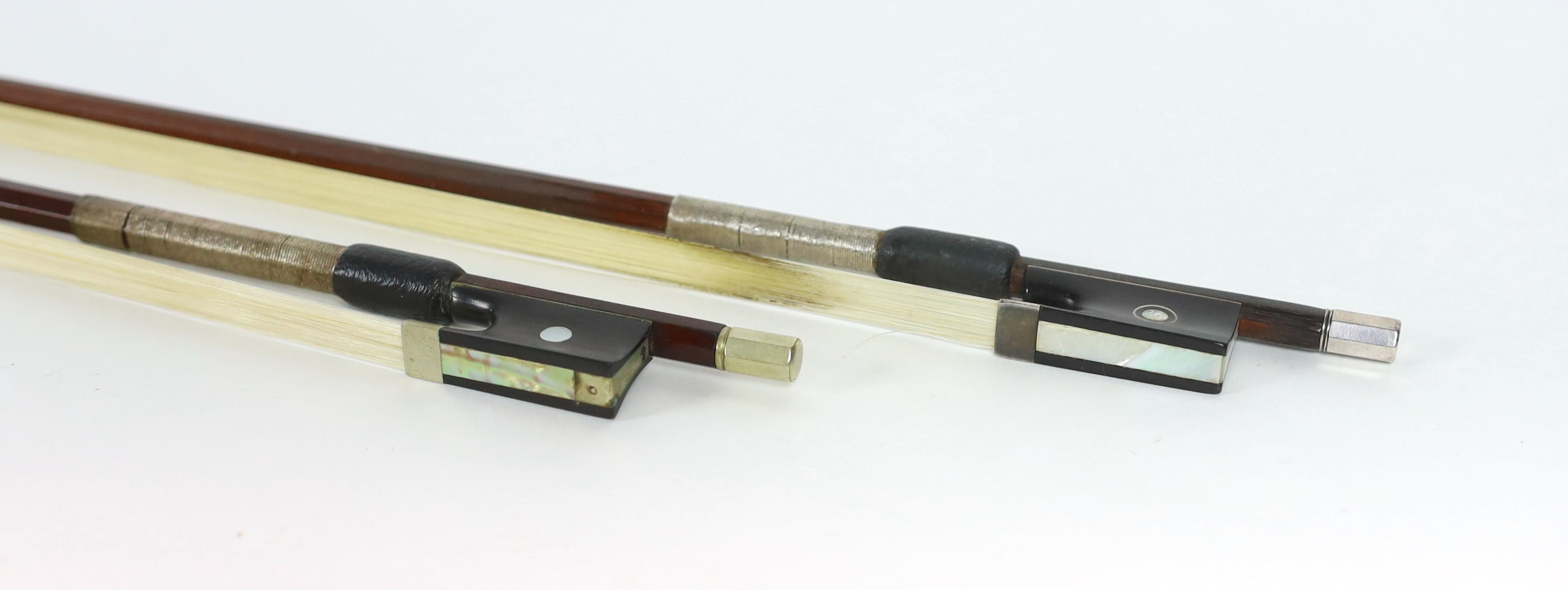 Two stamped violin bows, Both 74.5 cm long